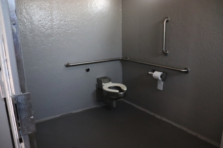 Accessible stall – handrail on back wall and the side of wall